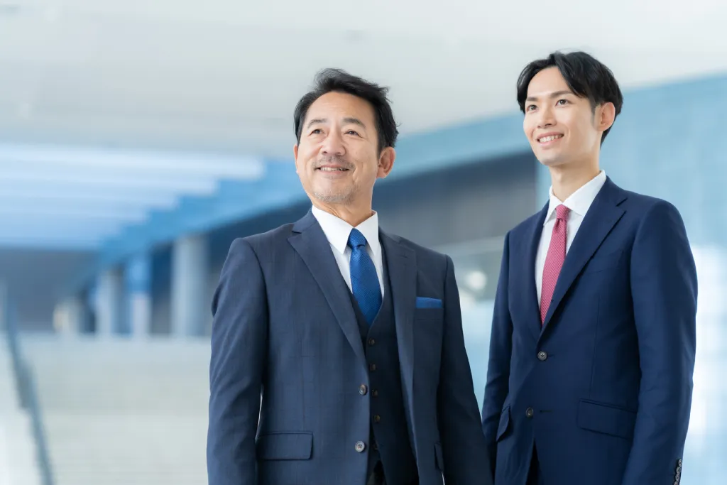 社長と同行する新入社員